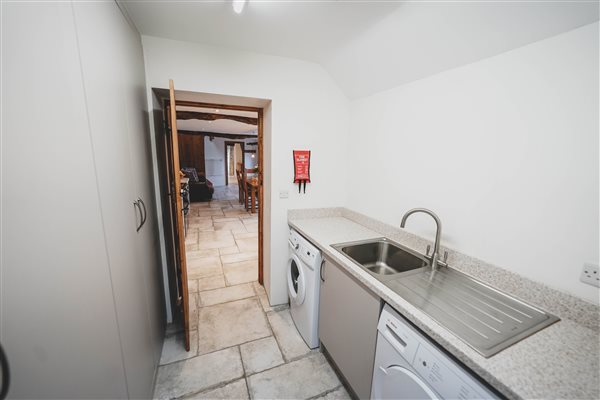 utility room with sink